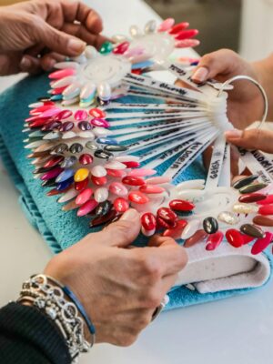 Diverse nail polish colors displayed in a salon for customer selection